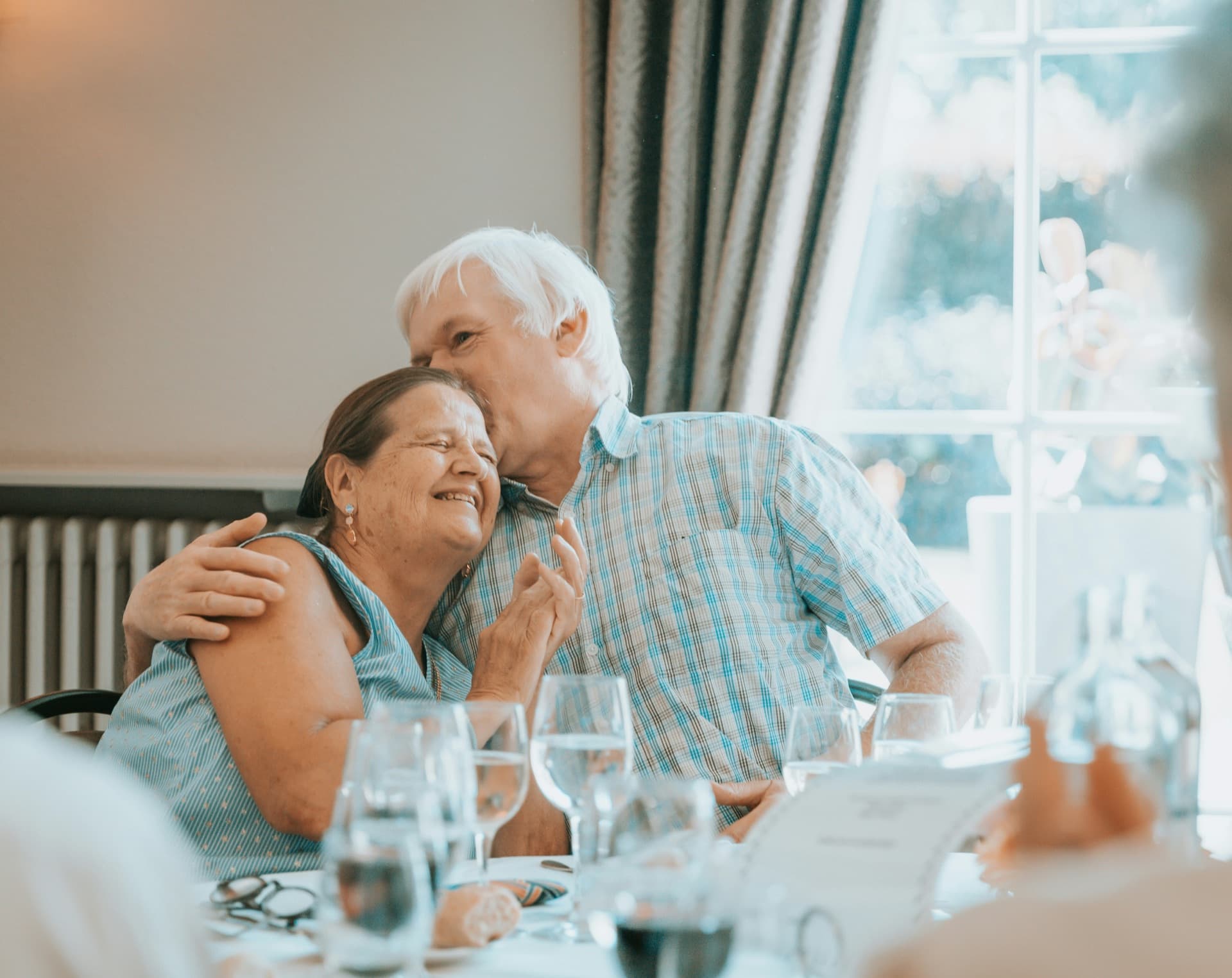 Senior couple sharing a moment at dinner