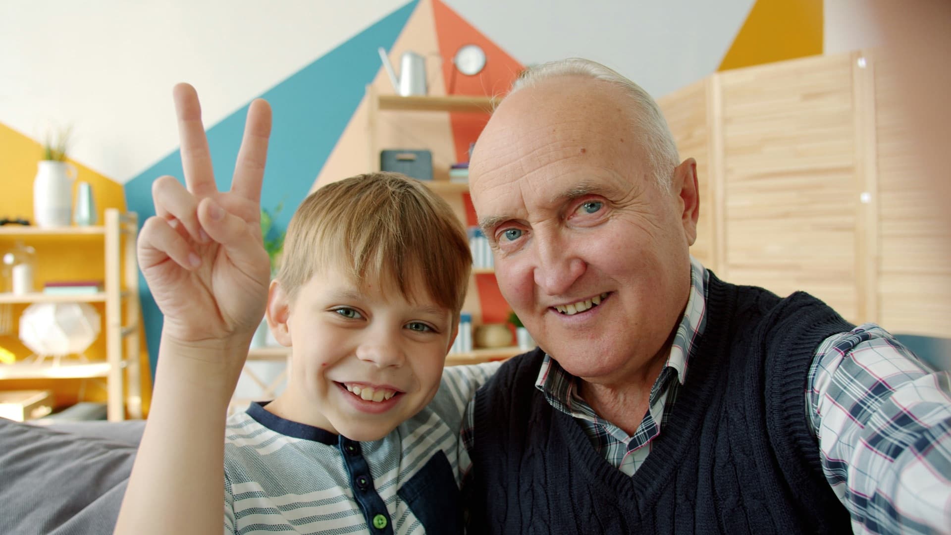 Grandfather and grandson taking a selfie