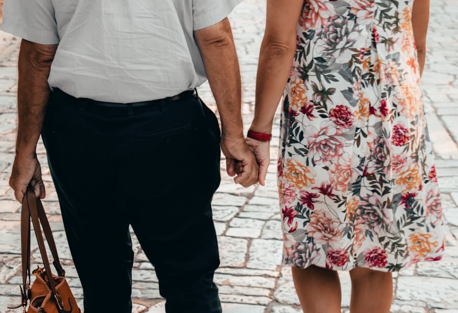 Senior couple holding hands, close-up
